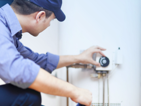 Worker completing an energy assestment. 