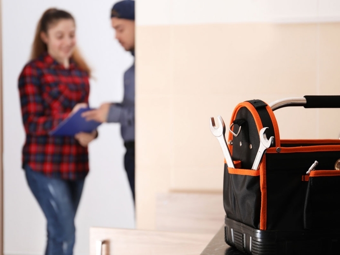 Contractor with homeowner at house