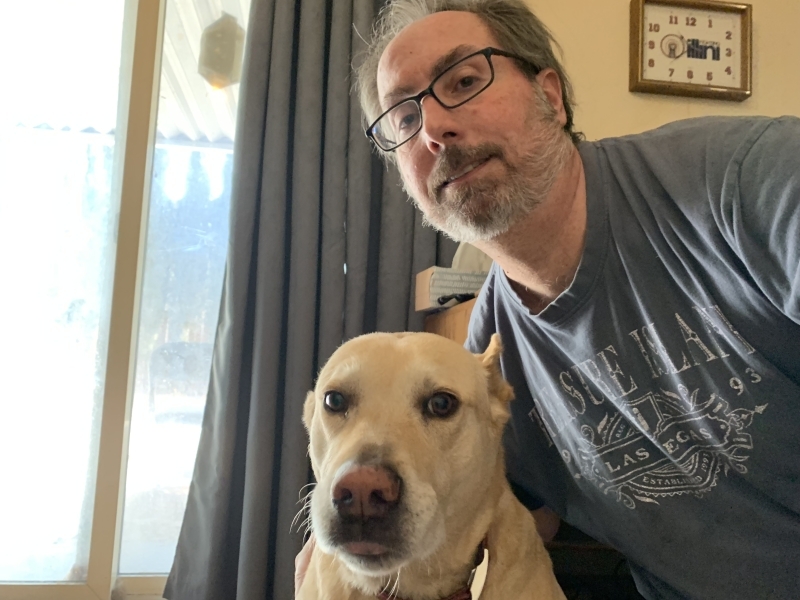 Bob with lab dog, Biscuit. 